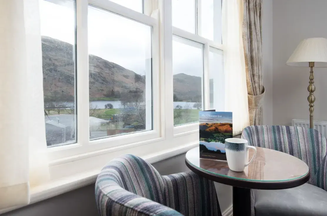 Lake view seating in a room at The Ullswater Inn
